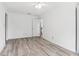 Neutral bedroom with light gray flooring, a ceiling fan, and white walls at 771 James Cir, Lawrenceville, GA 30046