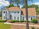 Charming two-story home with manicured lawn and inviting walkway at 771 James Cir, Lawrenceville, GA 30046