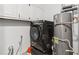 A clean laundry area featuring a modern washer and dryer setup at 771 James Cir, Lawrenceville, GA 30046