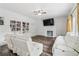 Comfortable living room with fireplace, built-in shelves and hardwood floors at 771 James Cir, Lawrenceville, GA 30046