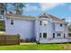 Rear view of this spacious home, showcasing deck and exterior features at 771 James Cir, Lawrenceville, GA 30046