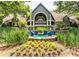 Attractive exterior view of building with well maintained landscaping, fountain, and manicured trees at 1025 Mcgill Park Ne Ave, Atlanta, GA 30312