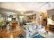 Bright living room with hardwood floors that flows into the kitchen and dining area at 1025 Mcgill Park Ne Ave, Atlanta, GA 30312