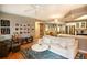 An open-concept living room with hardwood floors, neutral colors, and lots of seating at 1025 Mcgill Park Ne Ave, Atlanta, GA 30312