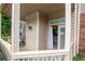 A cozy porch with a view of the neighborhood at 1025 Mcgill Park Ne Ave, Atlanta, GA 30312