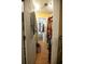 Spacious walk-in closet with hardwood floors and hanging rods for maximum storage and organization at 1025 Mcgill Park Ne Ave, Atlanta, GA 30312