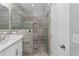 Modern bathroom features a glass-enclosed shower with tile surround and a white vanity at 250 Castleberry Station Sw Dr, Atlanta, GA 30313