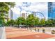 Centennial Olympic Park with pedestrian plaza and city buildings at 250 Castleberry Station Sw Dr, Atlanta, GA 30313