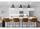 Modern kitchen with white cabinets, stainless steel appliances, and a large island at 250 Castleberry Station Sw Dr, Atlanta, GA 30313
