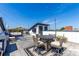 Rooftop deck with outdoor seating area, perfect for entertaining and relaxing under string lights at 250 Castleberry Station Sw Dr, Atlanta, GA 30313