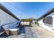 Comfortable rooftop deck with lounge seating, string lights, and an inviting atmosphere at 250 Castleberry Station Sw Dr, Atlanta, GA 30313