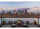 Relax on this rooftop patio with a fire pit and gorgeous skyline views at 250 Castleberry Station Sw Dr, Atlanta, GA 30313