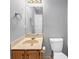 Bathroom featuring a vanity, toilet, and a mirror at 2682 Arbor Glen Pl., Marietta, GA 30066
