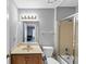 A bathroom featuring a vanity, toilet, and a shower at 2682 Arbor Glen Pl., Marietta, GA 30066