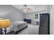 Bedroom with gray walls, gray carpet and vaulted ceiling with a ceiling fan at 2682 Arbor Glen Pl., Marietta, GA 30066