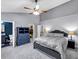 Bedroom with gray walls and carpet, vaulted ceiling, showing ensuite and walk-in closet at 2682 Arbor Glen Pl., Marietta, GA 30066