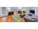 Living area with fireplace, sofas, and a view of the entry hall at 2682 Arbor Glen Pl., Marietta, GA 30066
