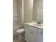 This bathroom has a tub, shower, sink, toilet, and vanity with white cabinets at 3708 Cheswolde Ave, Powder Springs, GA 30127