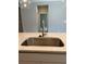Close up view of stainless sink and stone countertop on kitchen island at 3708 Cheswolde Ave, Powder Springs, GA 30127