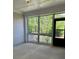Enclosed porch featuring outdoor views at 3708 Cheswolde Ave, Powder Springs, GA 30127