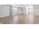 Bright and airy bedroom with neutral walls and laminate wood flooring at 4148 Kings Cswy, Ellenwood, GA 30294
