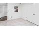 Open living room with large windows and plenty of natural light at 4148 Kings Cswy, Ellenwood, GA 30294