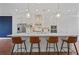 Modern kitchen featuring a large island with barstool seating and stainless steel appliances at 820 Kenway Ave, Roswell, GA 30076