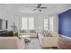 Cozy living room featuring neutral tones, hardwood floors, and ample seating perfect for relaxing or entertaining at 820 Kenway Ave, Roswell, GA 30076