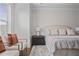 Inviting bedroom featuring a cozy bed, side tables, and neutral tones, creating a peaceful retreat at 820 Kenway Ave, Roswell, GA 30076
