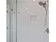 Modern bathroom featuring a tiled shower with a rainfall shower head and a built-in niche at 820 Kenway Ave, Roswell, GA 30076