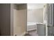 Bathroom featuring a shower stall, soaking tub and vanity with tile flooring at 175 Hearth Way, Fairburn, GA 30213