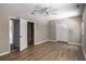 Large bonus room featuring wood-look floors and neutral colored walls with lots of room at 175 Hearth Way, Fairburn, GA 30213
