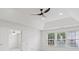 Bright bedroom featuring a modern ceiling fan, recessed lighting, and large windows at 3366 Bridge Walk Dr, Lawrenceville, GA 30044