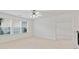 Upstairs room with bright windows and carpeted flooring with easy access to other rooms at 3366 Bridge Walk Dr, Lawrenceville, GA 30044