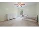 This bedroom is carpeted and features a large dresser and a trundle bed at 4092 Duran Ln, Auburn, GA 30011