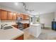 Beautiful eat-in kitchen with wooden cabinets, stainless appliances and an island at 4092 Duran Ln, Auburn, GA 30011