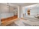 Elegant sitting room with stylish decor, hardwood floors, and seamless flow into other living areas at 4092 Duran Ln, Auburn, GA 30011
