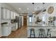 Modern kitchen featuring granite countertops, stainless steel appliances, and white subway tile backsplash at 1755 Waters Ferry Dr, Lawrenceville, GA 30043