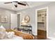 Comfortable bedroom with walk-in closet and hardwood floors at 2554 Saint Patrick Se St, Atlanta, GA 30317