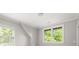 Bright bedroom showcasing two windows allowing natural light to illuminate the room at 2554 Saint Patrick Se St, Atlanta, GA 30317