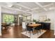 Elegant dining room with decorative ceiling, hardwood floors, and open layout at 2554 Saint Patrick Se St, Atlanta, GA 30317