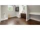Versatile flex room with hardwood floors, built-in cabinets, and sink perfect for laundry or hobbies at 2554 Saint Patrick Se St, Atlanta, GA 30317