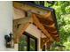 Stunning detail of the front entrance with light fixture and craftsman woodwork at 2554 Saint Patrick Se St, Atlanta, GA 30317