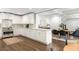 Modern kitchen with stainless appliances, marble countertops, and an open floor plan at 2554 Saint Patrick Se St, Atlanta, GA 30317