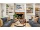 Cozy living room featuring a fireplace, built-in shelving, and stylish decor at 2554 Saint Patrick Se St, Atlanta, GA 30317