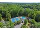 Aerial shot of community amenities, featuring tennis courts and a swimming pool at 2841 Landing Dr, Marietta, GA 30066