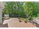 Spacious back deck with grill and green backyard, perfect for entertaining and relaxing outdoors at 2841 Landing Dr, Marietta, GA 30066