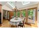 Charming dining area with skylights, hardwood floors, and scenic views of the surrounding greenery at 2841 Landing Dr, Marietta, GA 30066