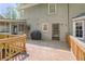 A spacious backyard features a wooden deck, providing outdoor entertainment and relaxation options at 3625 Stonehenge Ne Way, Marietta, GA 30066