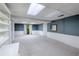 Finished basement area with neutral carpet and large windows for ample natural light at 3625 Stonehenge Ne Way, Marietta, GA 30066